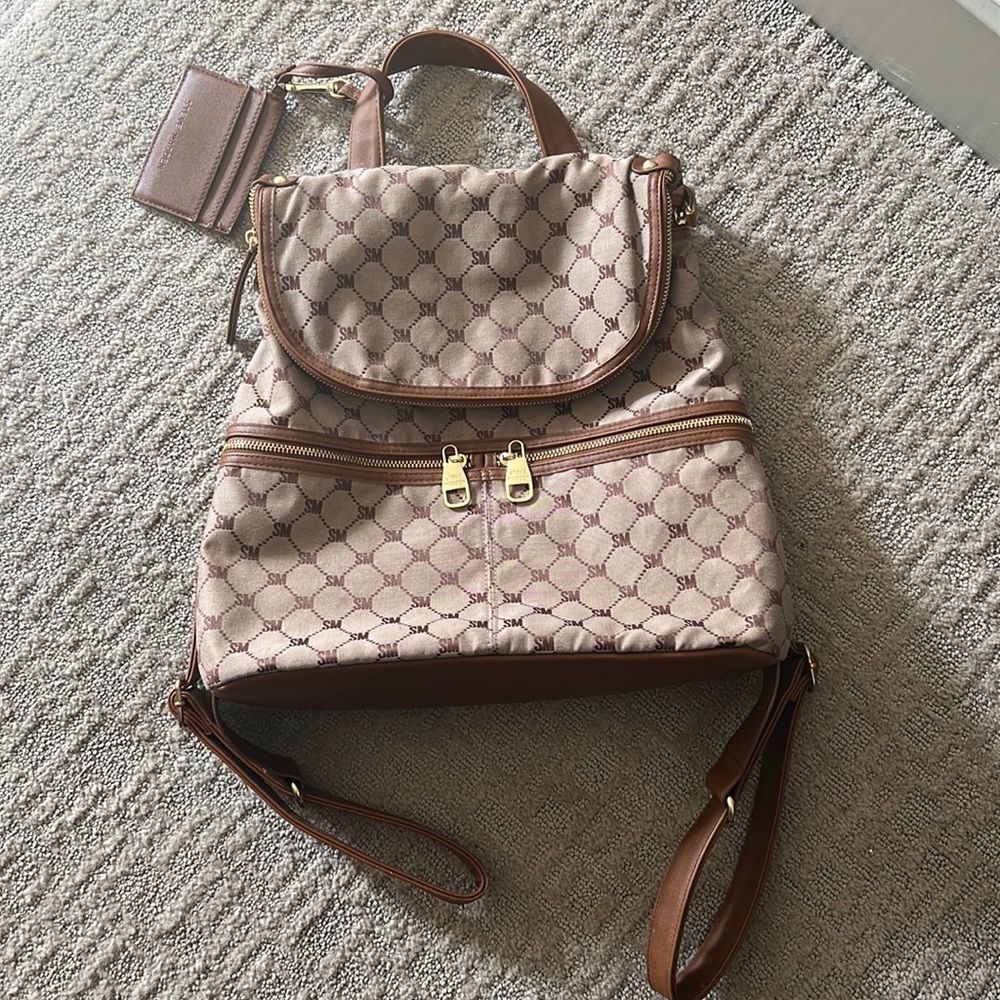 Brownish Steve Madden Backpack with Steve Madden ID holder key chain